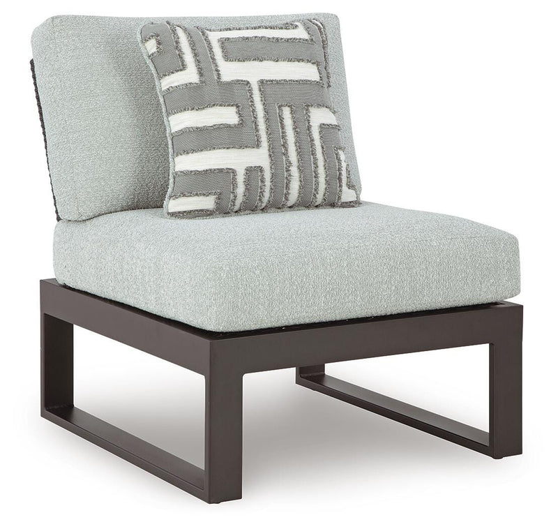 Outdoor Ashley Furniture Beachloft outdoor seating set with cushioned chairs and a matching table on a patio.