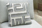 Ashley Furniture Beachloft outdoor sectional with plush pillows, featuring a woven rattan frame and comfortable cushion seating.