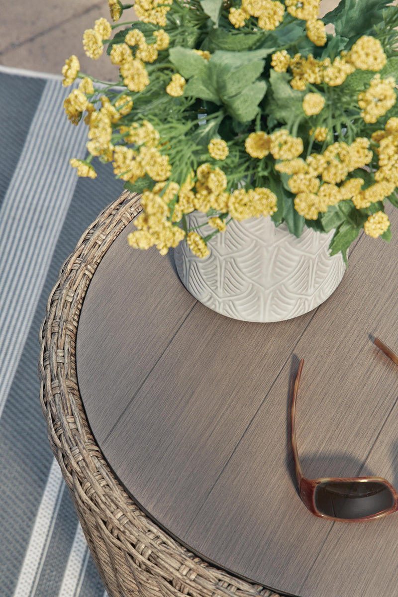 Ashley Furniture Danson outdoor end table with a sleek design, perfect for patio or garden decor.