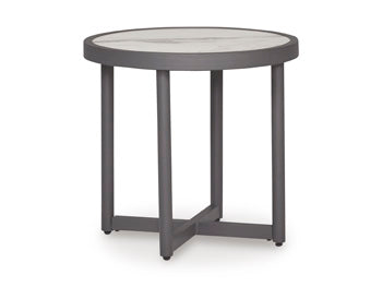 Ashley Furniture Ocean Beach outdoor end table with a woven rattan design and sturdy wooden legs, ideal for patio or garden.