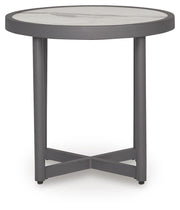 Outdoor end table from Ashley Furniture's Ocean Beach collection, featuring a natural wood finish and sturdy design.