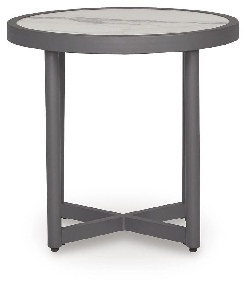 Outdoor end table from Ashley Furniture's Ocean Beach collection, featuring a natural wood finish and sturdy design.