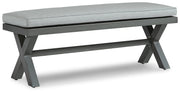 Outdoor dining bench with cushion by Ashley Furniture, featuring a sleek design and sturdy construction for outdoor seating.