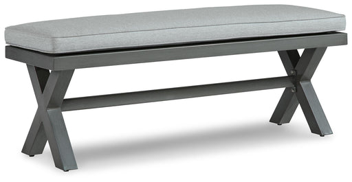 Outdoor dining bench with cushion by Ashley Furniture, featuring a sleek design and sturdy construction for outdoor seating.