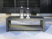 Outdoor table set from Ashley Furniture featuring a stylish, durable design with a table and matching chairs for outdoor use.