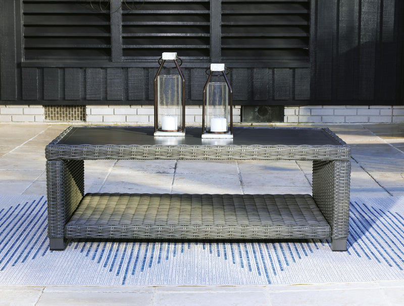 Outdoor table set from Ashley Furniture featuring a stylish, durable design with a table and matching chairs for outdoor use.