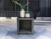 Outdoor end table from Ashley Furniture's Elite Park collection, featuring a stylish design ideal for outdoor living spaces.
