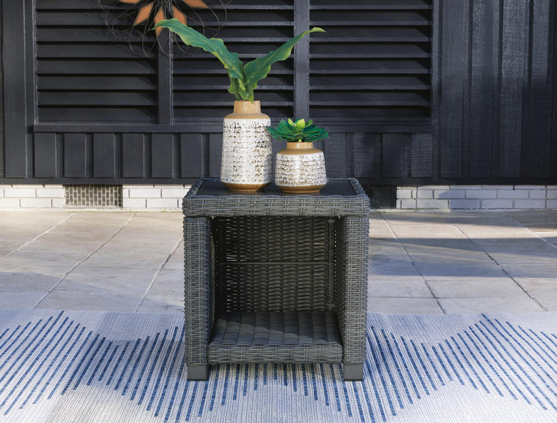 Outdoor end table from Ashley Furniture's Elite Park collection, featuring a stylish design ideal for outdoor living spaces.