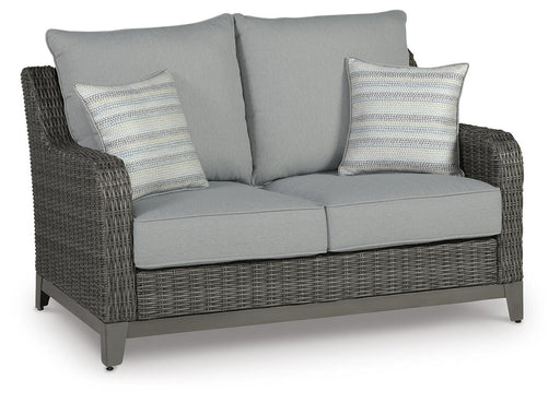 Ashley Furniture Elite Park outdoor loveseat with cushion, featuring weather-resistant design and comfortable seating for outdoor spaces.