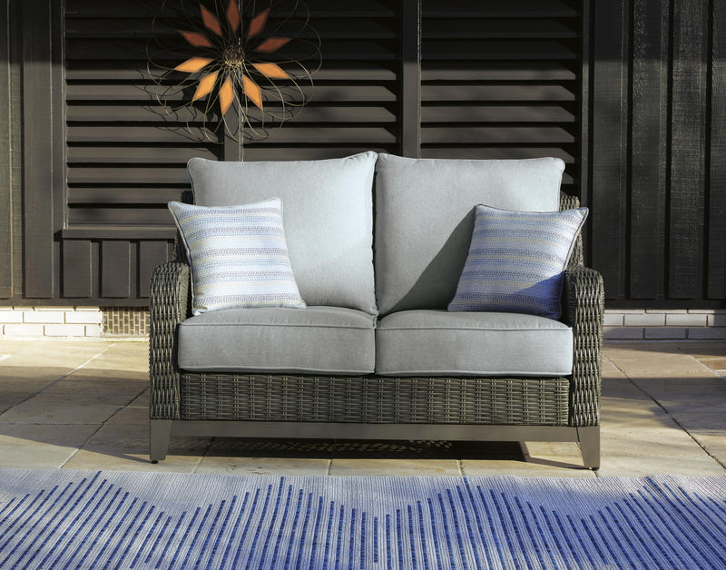 Ashley Furniture Elite Park outdoor loveseat with cushion, featuring a stylish frame and comfortable seating for outdoor relaxation.