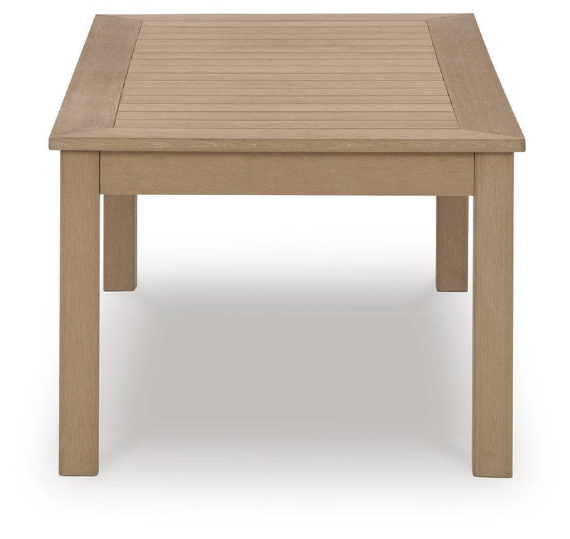Ashley Furniture Hallow Creek outdoor cocktail table with a wooden design, perfect for patio or garden decor.