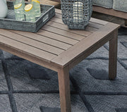 Outdoor cocktail table from Ashley Furniture's Hillside Barn collection, showcasing a rustic wooden design suitable for outdoor spaces.