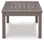 Ashley Furniture Hillside Barn outdoor cocktail table with a rustic wood finish, ideal for patio or garden seating areas.