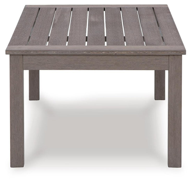 Ashley Furniture Hillside Barn outdoor cocktail table with a rustic wood finish, ideal for patio or garden seating areas.