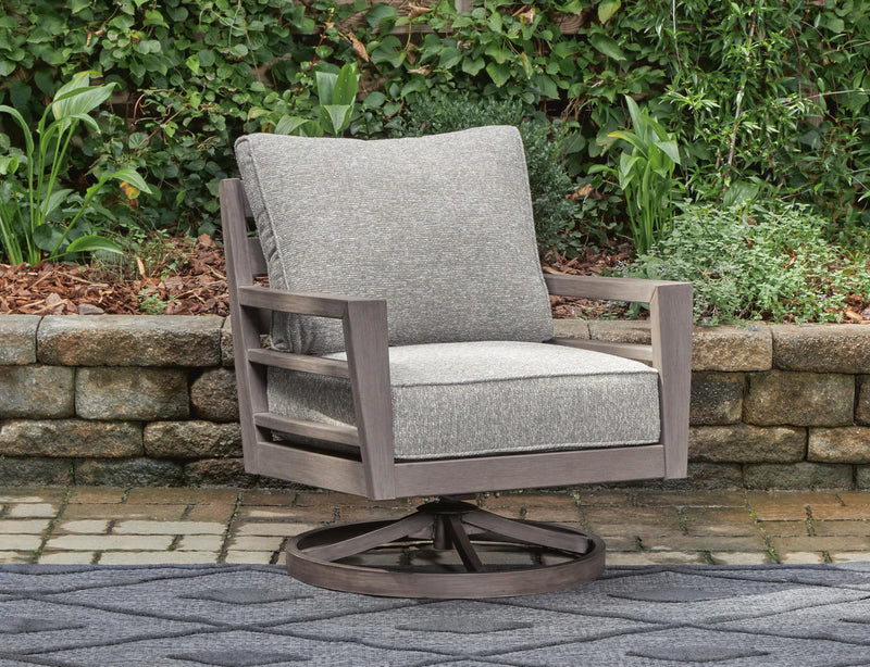 Ashley Furniture Hillside Barn outdoor swivel lounge chair with cushion, featuring a cozy, rustic design and comfortable seating.