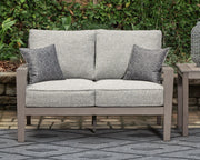 Ashley Furniture Hillside Barn outdoor loveseat with cushion, featuring a sturdy wooden frame and comfortable seating for outdoor spaces.