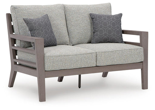 Ashley Furniture Hillside Barn outdoor loveseat with cushion, featuring a wooden frame and comfortable seating set.