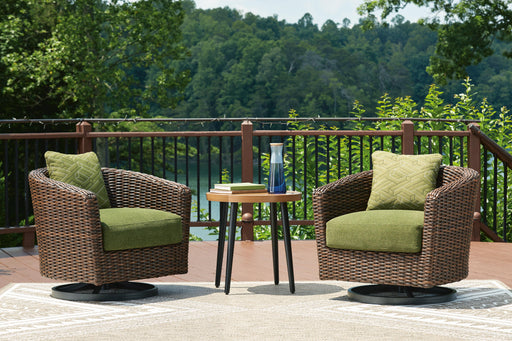 Outdoor table set from Ashley Furniture Horizon Hall Outdoor Package, featuring a spacious table and matching chairs in a stylish design.