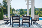 Ashley Furniture East Beach outdoor dining set with a rectangular table and six chairs, ideal for patio or garden dining.
