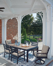 Ashley Furniture East Beach outdoor dining set with a table and chairs, perfect for patio or backyard outdoor dining.