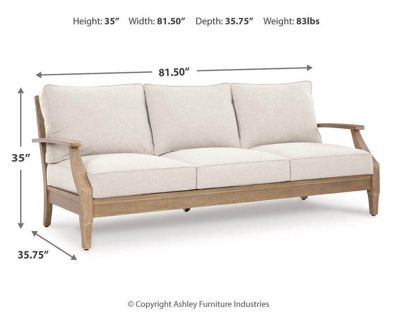 Ashley Furniture Carter Hall outdoor table set with a spacious table and matching chairs, ideal for outdoor dining and entertaining.