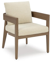 Ashley Furniture Serene Bay outdoor dining set with a rectangular table and six chairs, featuring a modern design for outdoor dining.