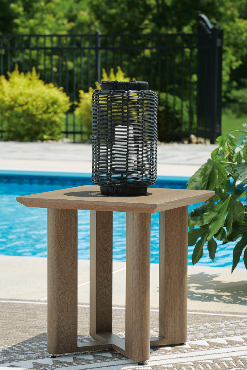 Ashley Furniture Serene Bay outdoor end table with a weather-resistant design, featuring a slatted top and sturdy frame.