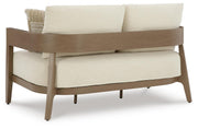 Ashley Furniture Serene Bay outdoor loveseat with cushions, featuring a stylish wooden frame and comfortable seating for outdoor spaces.