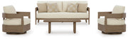 Ashley Furniture Serene Bay outdoor seating set with cushioned chairs and a glass-top table in a backyard setting.