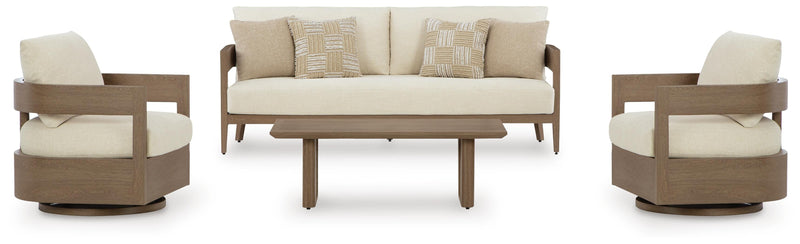 Ashley Furniture Serene Bay outdoor seating set with cushioned chairs and a glass-top table in a backyard setting.