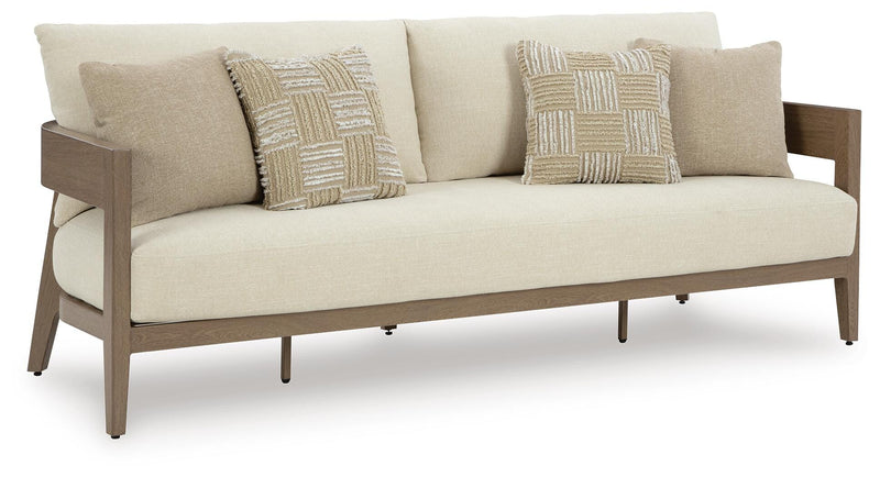 Ashley Furniture Serene Bay outdoor sofa with cushions, featuring a stylish outdoor seating design and comfortable cushion upholstery.