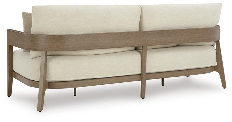 Ashley Furniture Serene Bay outdoor sofa with cushion, featuring plush seating and stylish design for outdoor relaxation.