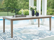 Outdoor dining table from Ashley Furniture's Rainier Ranch collection, featuring a sturdy wooden surface and outdoor-ready design.