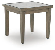 Outdoor end table by Ashley Furniture from Rainier Ranch collection, featuring a rustic wooden top and sturdy metal legs.