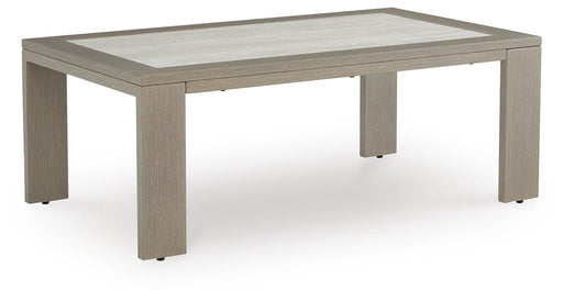 Ashley Furniture Kimpton Isle outdoor cocktail table with a round wooden top and metal frame, perfect for patio or garden spaces.