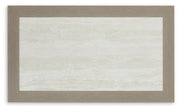 Ashley Furniture Kimpton Isle outdoor cocktail table with a slatted wood top and sturdy metal frame for patio use.