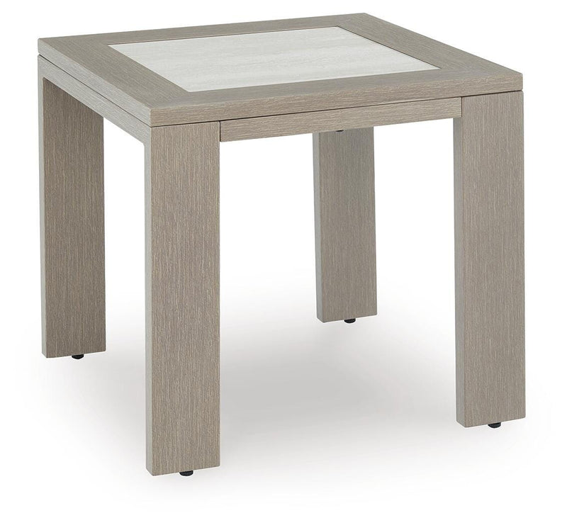 Ashley Furniture Kimpton Isle outdoor end table with a round metal frame and glass top, designed for patio and garden use.
