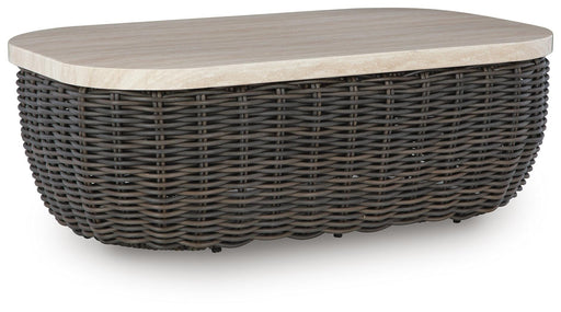 Ashley Furniture Kimora outdoor cocktail table with wooden slats and metal frame, shown from an angled view.