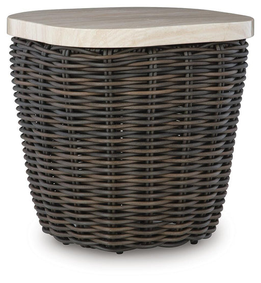 Ashley Furniture Kimora outdoor end table with a woven rattan-style design and sturdy wooden legs, perfect for patio or garden.