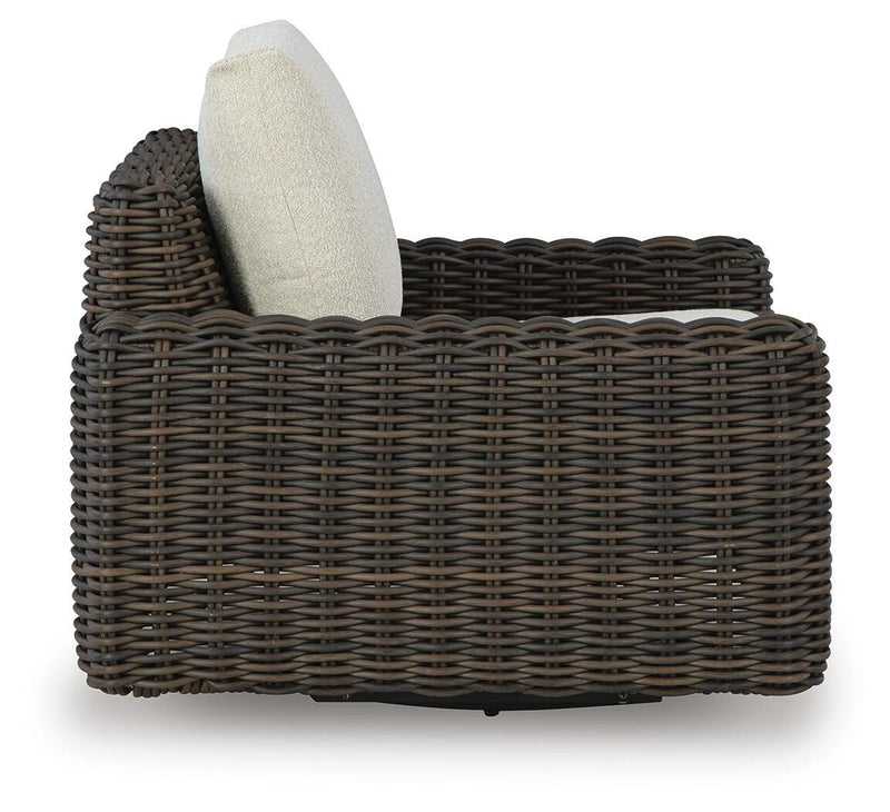 Ashley Furniture Kimora outdoor swivel lounge chair with cushioned seat and backrest, perfect for patio relaxation.