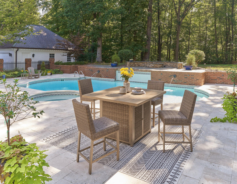 Ashley Furniture Walton Bridge outdoor dining set with a table and matching chairs for stylish outdoor gatherings.