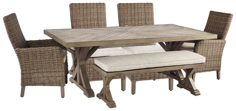 Ashley Furniture Beachcroft outdoor dining set with a table and six chairs in a patio setting, perfect for outdoor meals