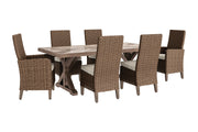 Ashley Furniture Beachcroft outdoor dining set with a table and six chairs for stylish outdoor meals.