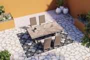 Ashley Furniture Beachcroft outdoor dining set with a table and chairs, ideal for garden or patio outdoor meals.