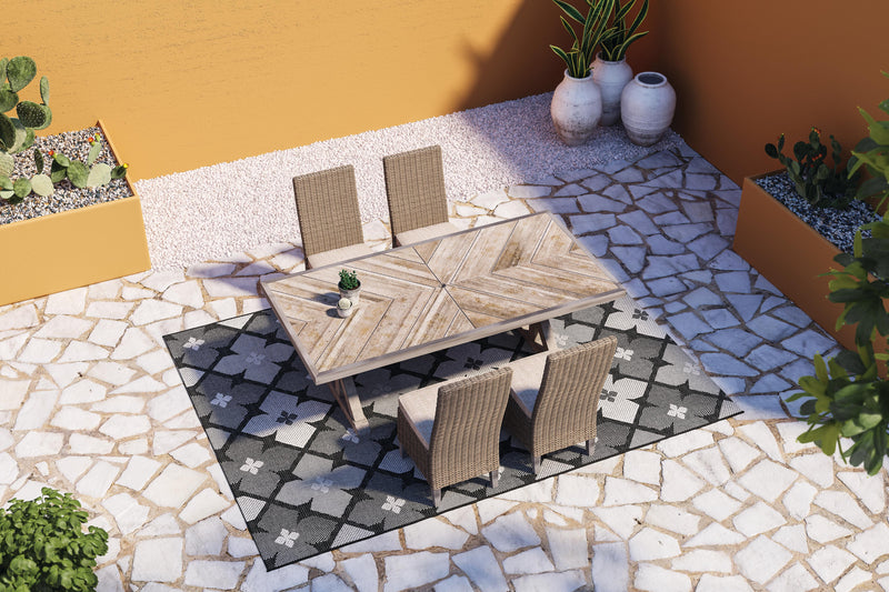 Ashley Furniture Beachcroft outdoor dining set with a table and chairs, ideal for garden or patio outdoor meals.