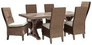 Outdoor Ashley Furniture Beachcroft outdoor dining set with a table and chairs, ideal for patio dining and outdoor gatherings.