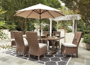 Ashley Furniture Beachcroft outdoor dining set with a table and chairs, ideal for patio and garden outdoor dining spaces.