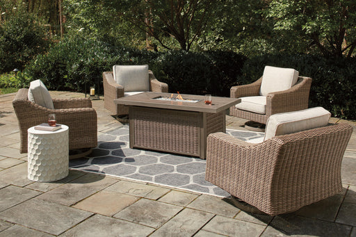 Outdoor seating set with a Fire Pit Table and four Ashley Furniture Nuvella swivel lounge chairs on a patio.