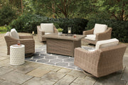 Outdoor Ashley Furniture beachcroft fire pit table with four Nuvella swivel lounge chairs on patio.