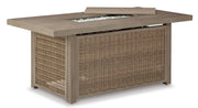 Ashley Furniture Beachcroft outdoor seating set with cushioned chairs and a glass-top table, designed for outdoor relaxation.
